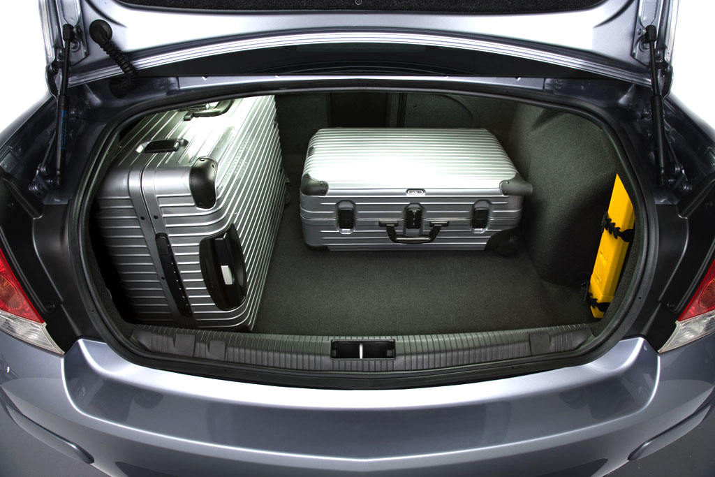 Что лучше киа рио или опель астра